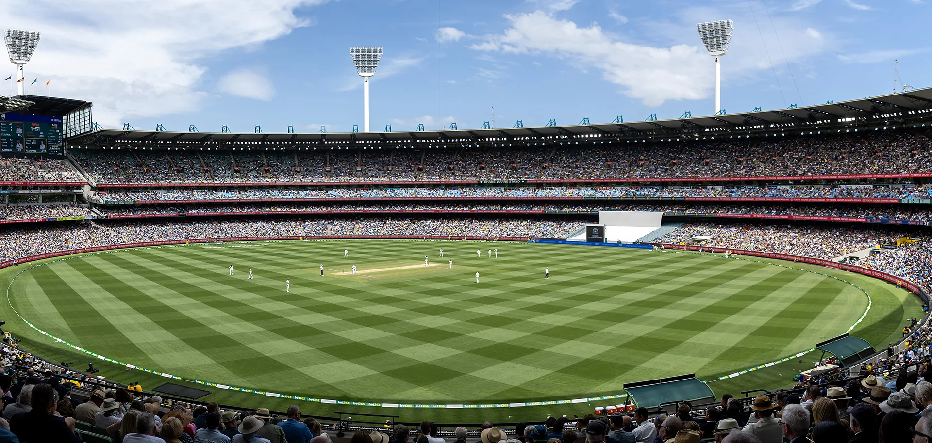 Cricket match and blue skies at the MCG