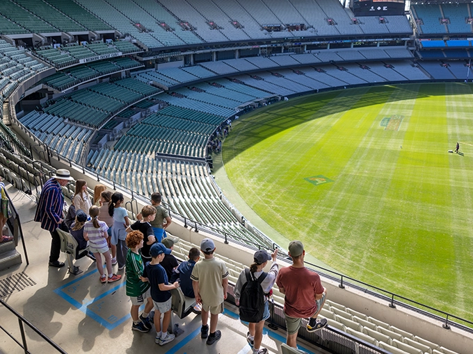 MCG Tours and Experiences A group looks over the MCG arena from Level 4