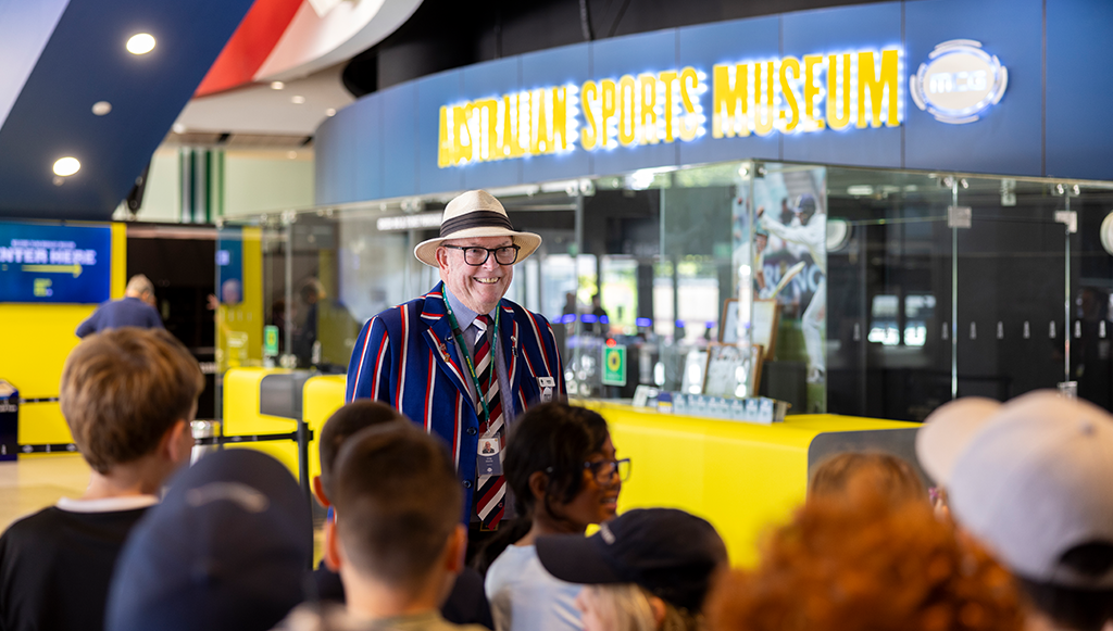 MCG Tours and the Australian Sports Museum An MCG Tour Guide stands at the entry to the Australian Sports Museum