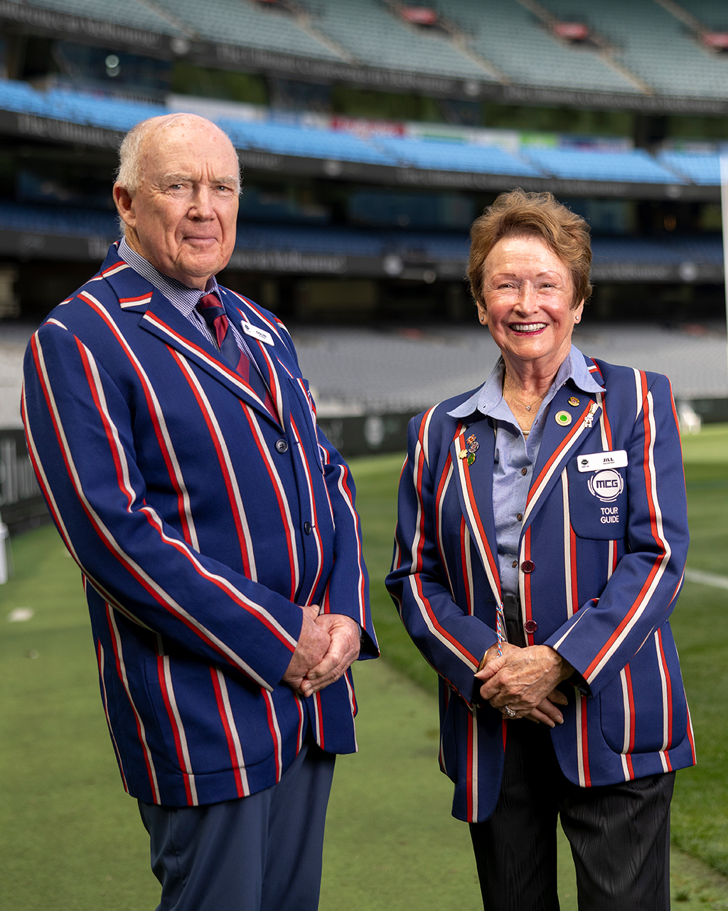 MCG Tour Guides Two MCG Tour Guides stand on the boundary of the MCG