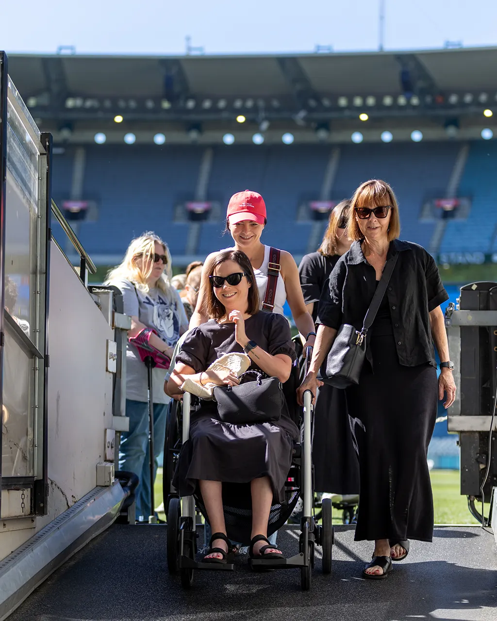 Stadium visitors use a downhill exit that is accessible by wheelchair