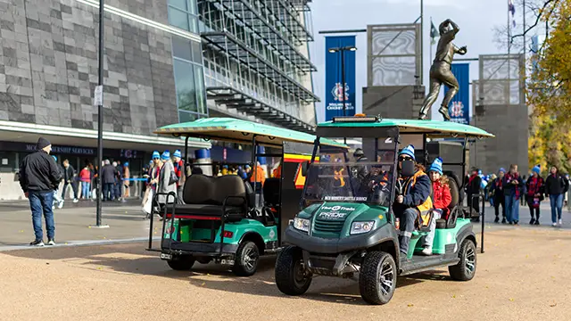 Buggies parked on the side of the MCG concourse
