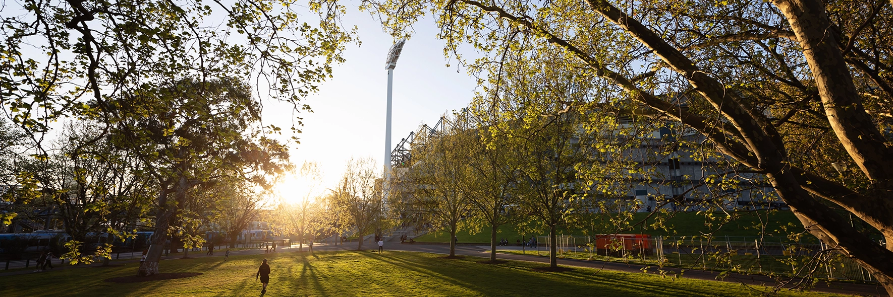 A tree-lined view of Gate 1 of the MCG A tree-lined view of Gate 1 of the MCG