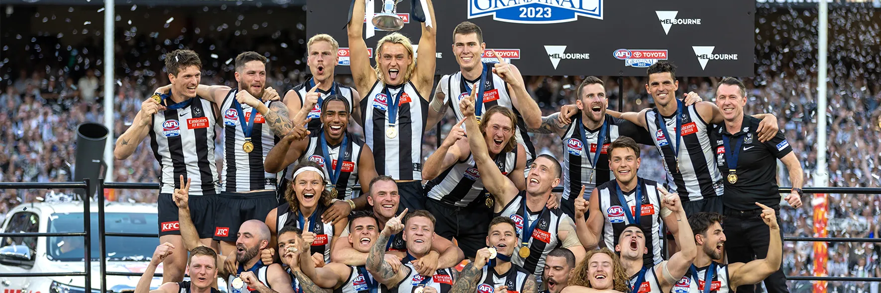 AFL23GF_COLLvBRIS_517_AFL_Collingwood_PageBanner_Desktop.webp