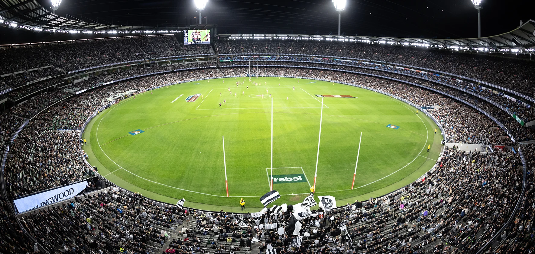 Collingwood AFL match under lights at the G