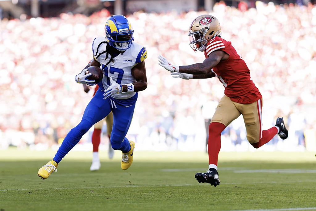 LA Rams #17 completes a catch against San Francisco 49ers #0 during an NFL game