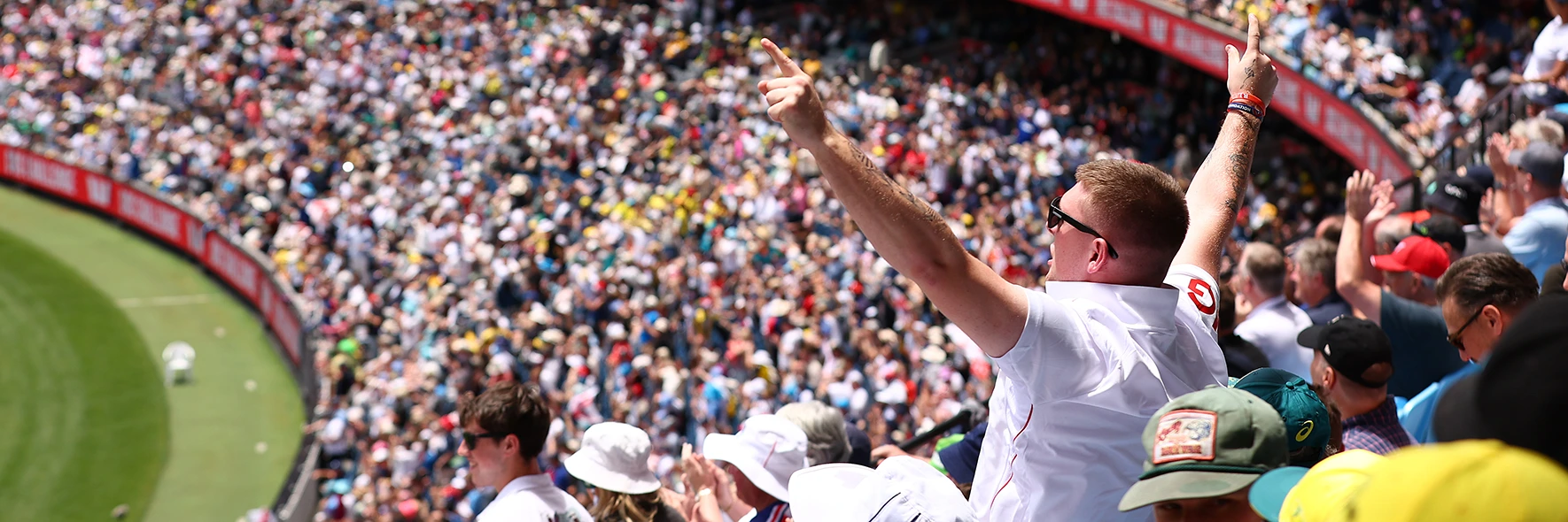England cricket fans celebrate in the stands at the Boxing Day Test