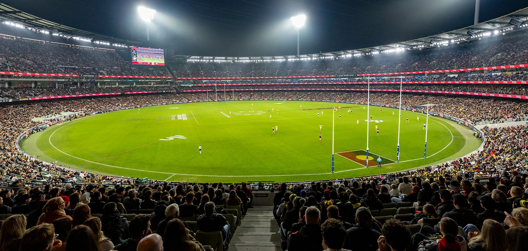 Dreamtime match at MCG with Aboriginal flag painted in goal square
